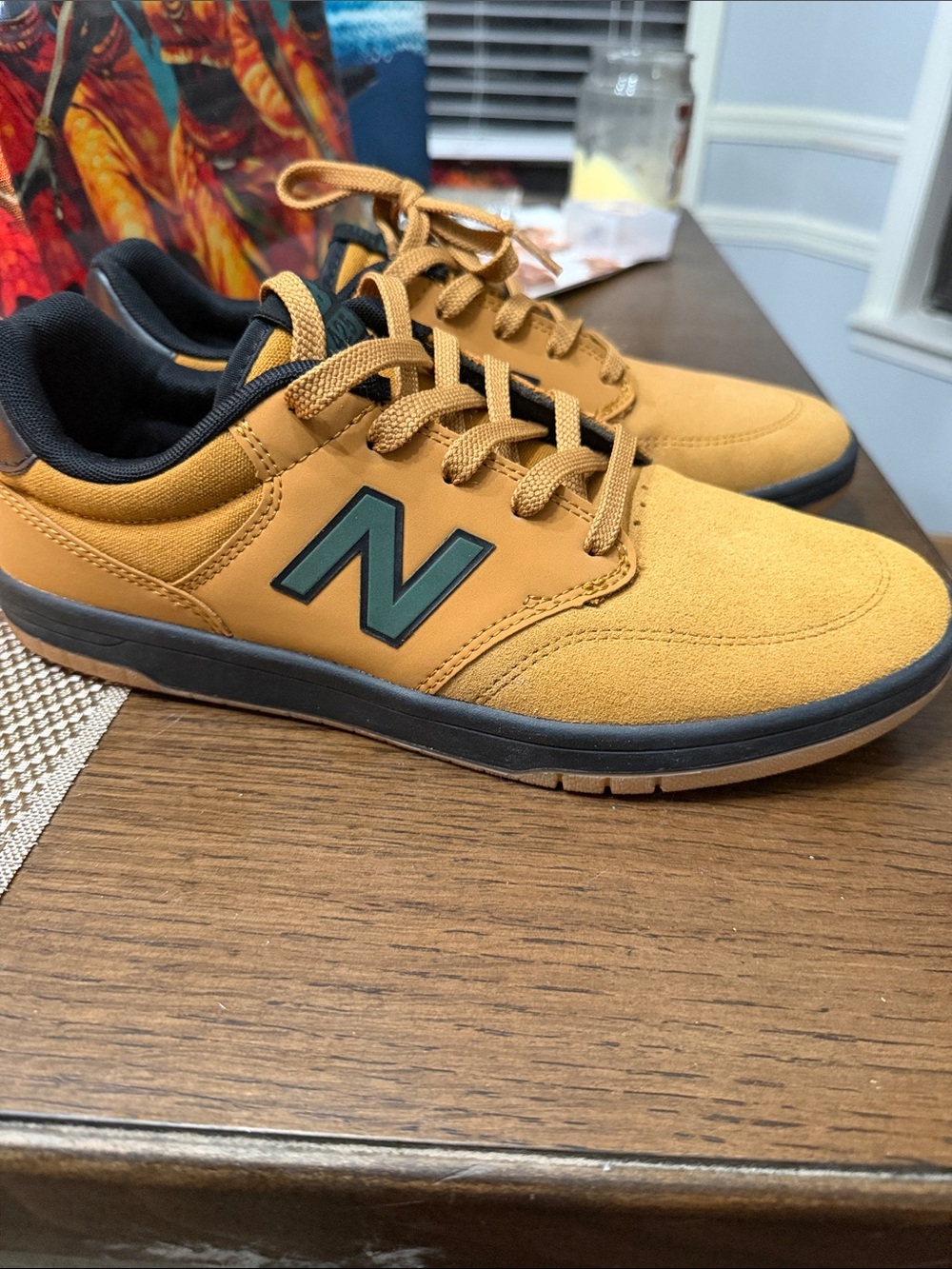 New Balance Men's Suede Low-Top Sneakers in Wheat with Black Accents